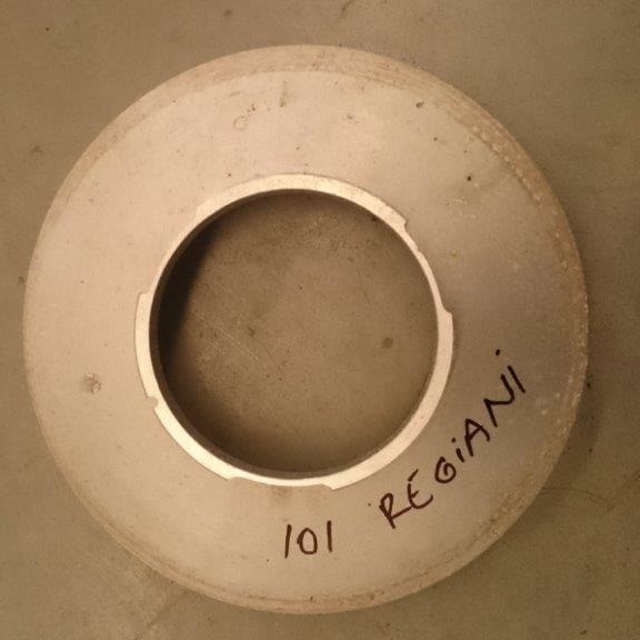 A 1018 mm Reggiani rotary screen head, with its size and machine make written on it